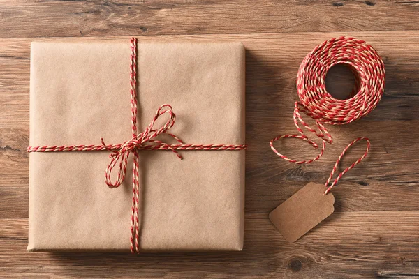 Plain Wrapped Present and String — Stock Photo, Image