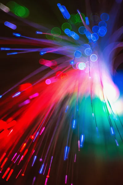 Defocused bokeh lights: optic fiber close-up — Stock Photo, Image