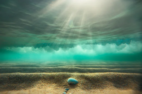 A homokos tengerfenék, víz alatti háttér — Stock Fotó