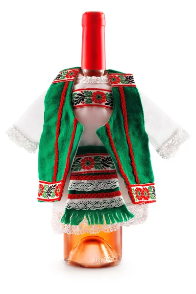 Garrafa de vinho vestida com traje de folclore europeu — Fotografia de Stock