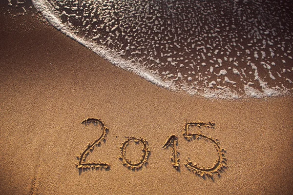 Nouvel an 2015 écrit en sable — Photo