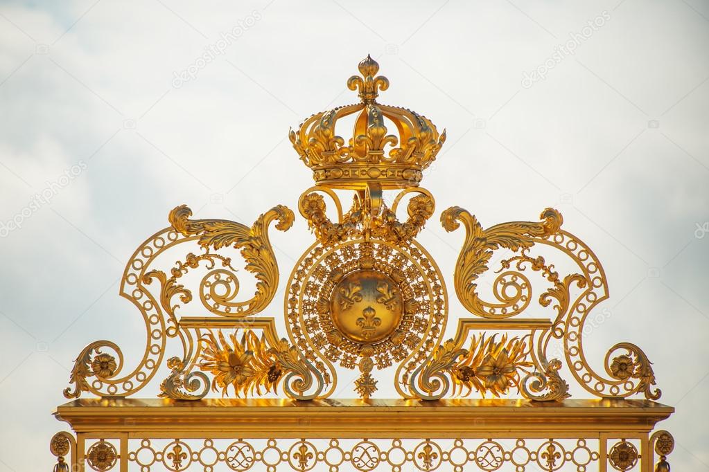 Golden arches on the entrance of Versailles palace in Paris, Fra