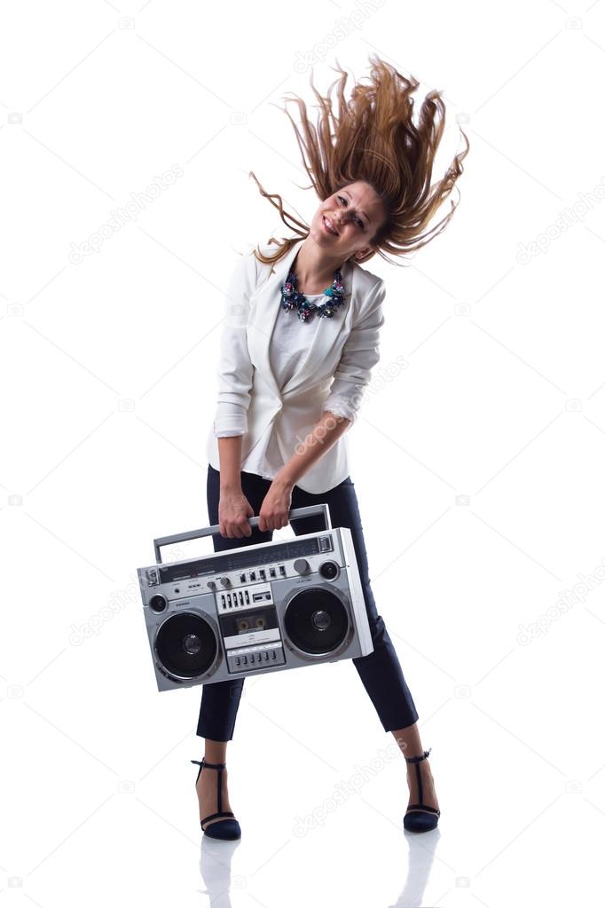 Attractive young cool hip hop dancer with boom box