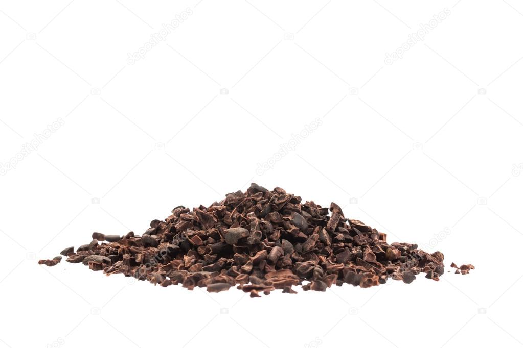 Raw organic cacao nibs isolated on white