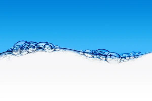 Water and air bubbles over white — Stock Photo, Image