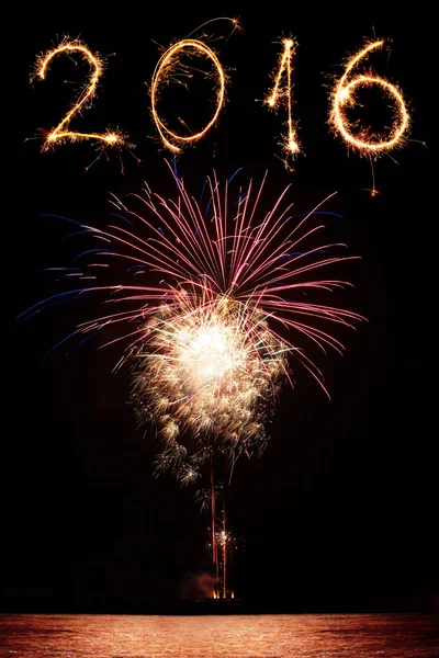 2016 written with fireworks as a background — Stock Photo, Image