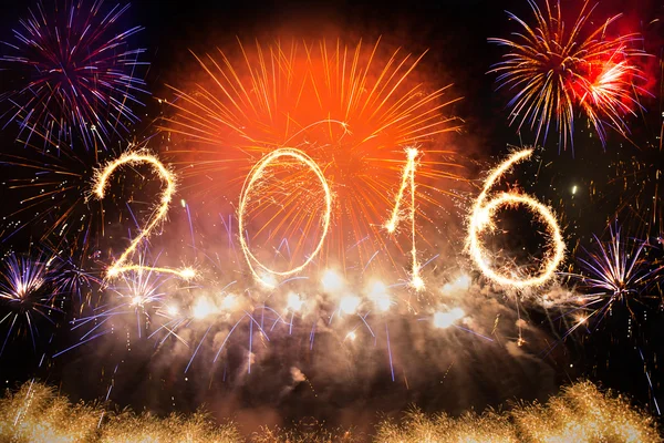 2016 written with fireworks as a background — Stock Photo, Image