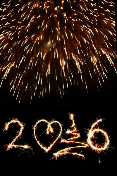 2016 written with fireworks as a background — Stock Photo, Image