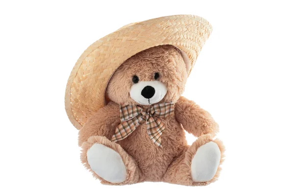 Urso de pelúcia fofo com chapéu de palha isolado em um backgro branco — Fotografia de Stock