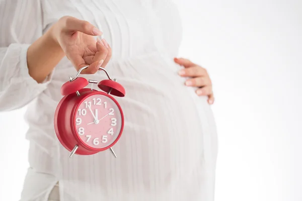 Liczenie godzin oczekuje narodzin dziecka. Koncepcja macierzyństwo. Pregna — Zdjęcie stockowe