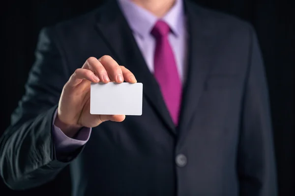 Business man showing a blank business card isolated, close up — Stock Photo, Image