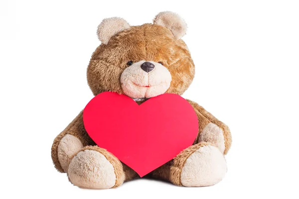 Teddy Bear Holding a Heart on white — Stock Photo, Image