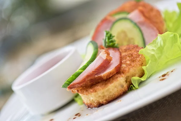 Pancakes with ham and cucumber — Stock Photo, Image