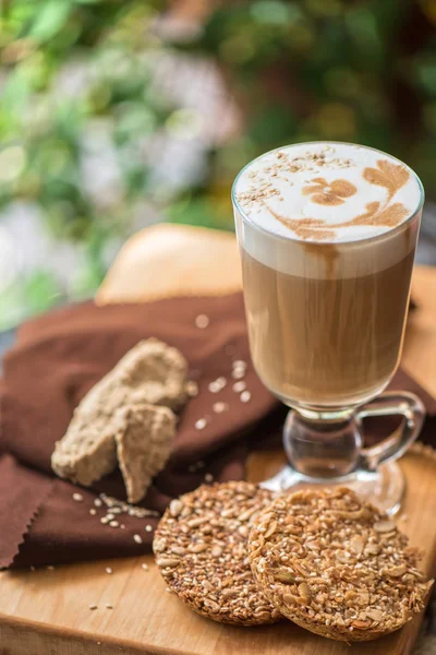 Coffee latte cup with cookies — Stock Photo, Image