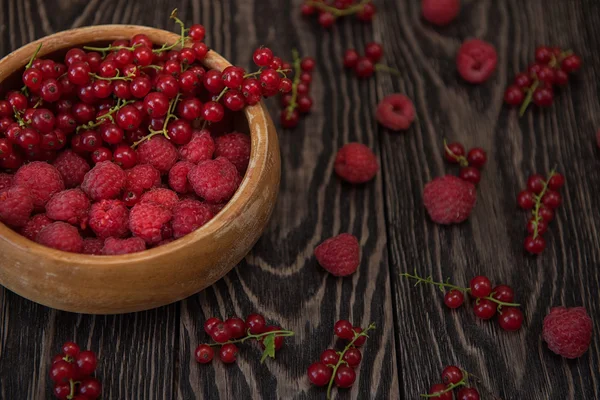 Fresh berries on wooden table — Stock Photo, Image