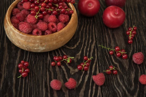 Fresh berries on wooden table — Stock Photo, Image