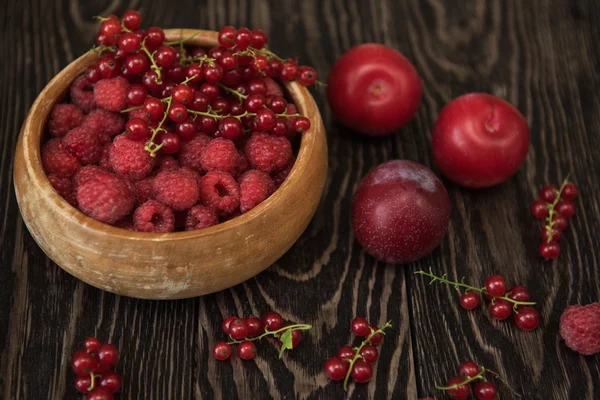 Fresh berries on wooden table — Stock Photo, Image