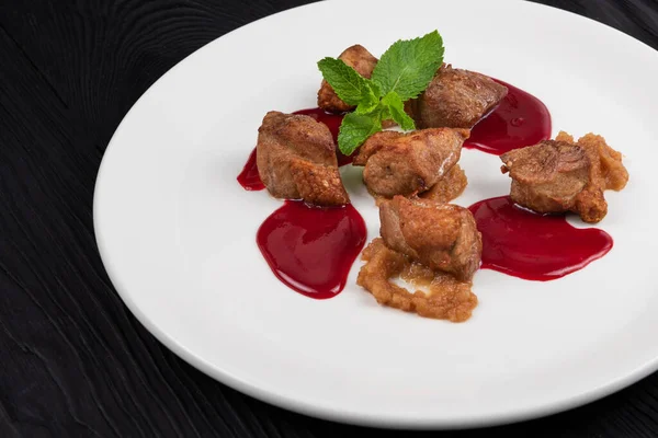 Pork meat with berries sauce — Stock Photo, Image