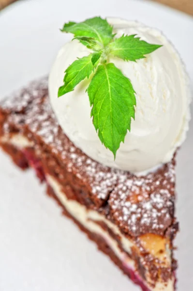 Chocolate cake with jam ice cream — Stock Photo, Image