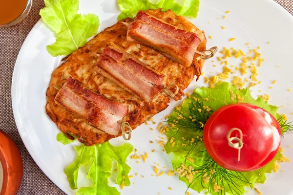 Veal meat with bacon — Stock Photo, Image