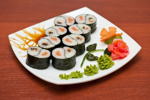 Roll with smoked eel and salmon — Stock Photo, Image