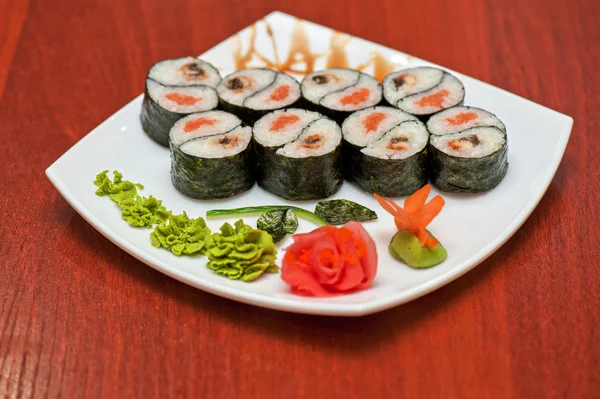 Roll with smoked eel and salmon — Stock Photo, Image