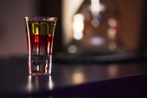 Drink shot at bar counter — Stock Photo, Image