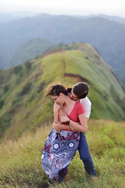 Man hugs woman — Stock Photo, Image