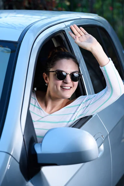 Woman driver saying hi — Stock Photo, Image