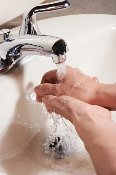 Washing hands in water — Stock Photo, Image