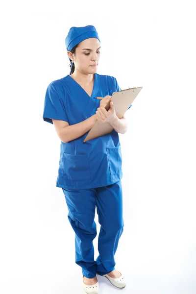 Enfermera escribir en clip de papel — Foto de Stock