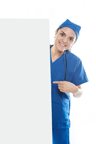 Sjuksköterska punkt på tomt utrymme — Stockfoto
