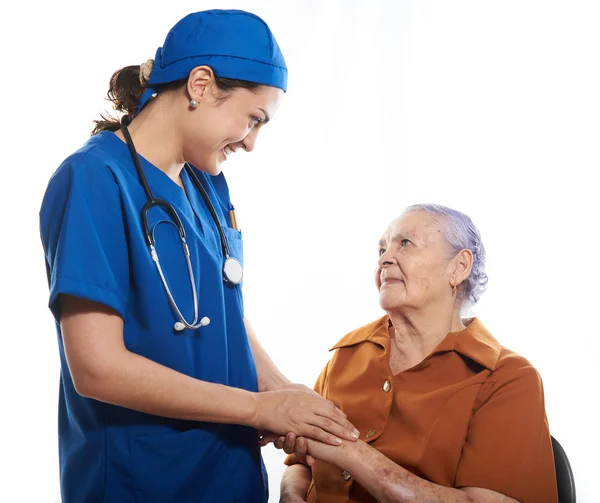 Enfermeira apoiar senhora idosa — Fotografia de Stock