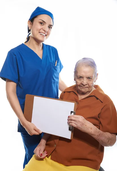 Medico con appunti e vecchio paziente — Foto Stock