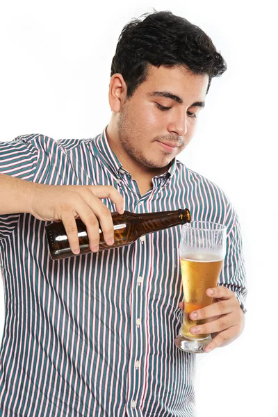 Guy pouring beer in glass — Stock Photo, Image