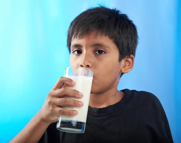 Latino boy drink milk — Stock Photo, Image