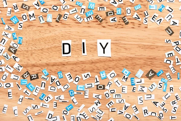 Palavra DIY de letras cortadas — Fotografia de Stock
