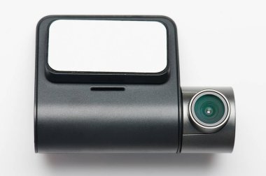 Gri modern kamera beyaz stüdyo arka planında izole edilmiş.