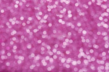 Bulanık pembe parıltılı arka plan. Mor ışıklı ışık çemberi