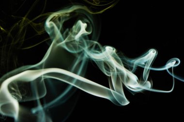 Abstract smoke swirls blue color on black background. Elegant colorful curves wallpaper