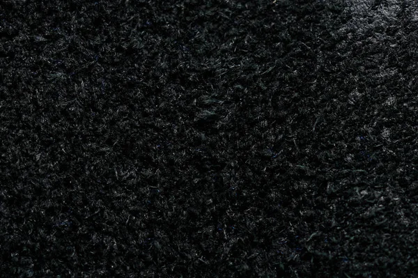 黒アルカンターラ革の表面の背景テクスチャマクロを閉じるビュー — ストック写真