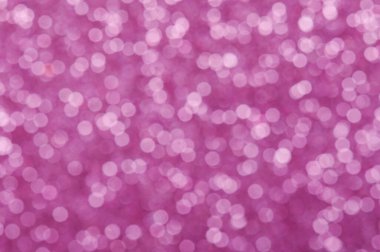 Pembe arka planda parlak beyaz daireler yakın plan görüntüsü