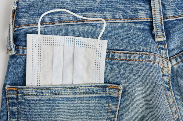 White Cotton Mask Back Blue Jeans Pocket Close View — Stock Photo, Image