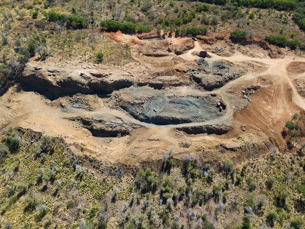 Dirt sand mine quarry above top drone view at day light