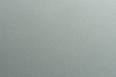 Hafif parıltılı pürüzsüz gri plastik yüzey, çeşitli tasarım amaçlarına uygun minimalist ve modern görünüş yaratıyor..