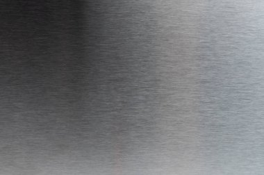 Cilalanmış metal yüzey arka plan makrosu yakın görünüm