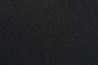 Koyu dokulu kağıt madde yüzeyi ve gün boyunca doğal ışık altında gözlemlenen desenler..