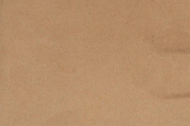 Yüzey düz kahverengi bir alan, desenli bir görünüş ve basit bir tasarım gösteriyor. Rengi doğal ve dünyevi görünüyor, yumuşak çizgilerle..