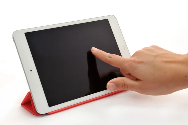 Touching tablet with finger — Stock Photo, Image