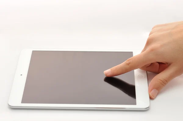 Touching tablet with finger — Stock Photo, Image